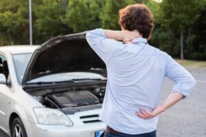 Man suffering from back and neck injury after car accident