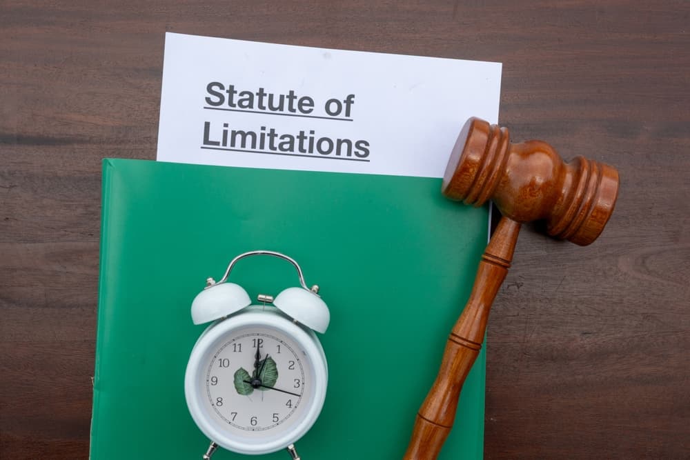 Visual concept of statute of limitations in law, featuring a gavel, clock, and legal document—highlighting urgency in filing legal claims on time.